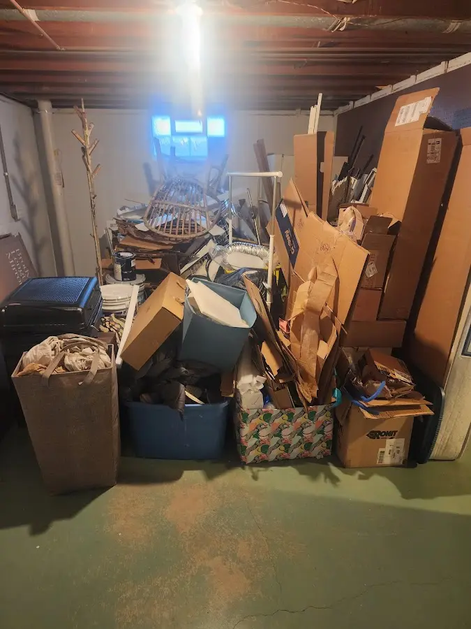 Roll-off dumpster container at job site for 2 Yard Dumpster Rental in Nokomis